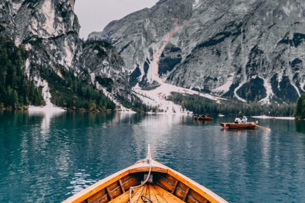 people in brown wooden boat