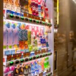 a vending machine with a variety of drinks on it
